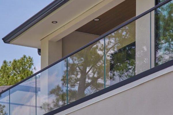 Glass and Black Base Rail on a Golf Course - Viewrail